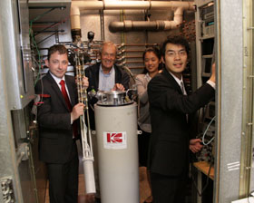 Researchers at UCSD and the SQUID cryostat.
