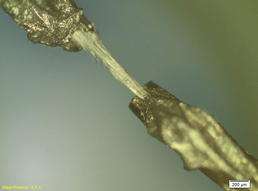 An optical image of the microtube bundle placed between two electrodes  Credit: Kholkin et al., Applied Physics Letters