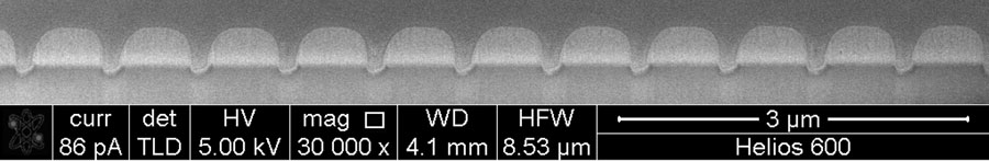 A cross-sectional scanning electron microscopy images of a 750 nm period grating fabricated by focused ion beam milling in a 300 nm thick amorphous germanium antimony telluride film on silica.   Credit: Karvounis/Gholipour/MacDonald/Zheludev, Optoelectronics Research Centre, University of Southampton