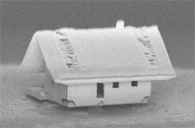 A microhouse’s tiled roof shows the ion gun’s new ability to focus on a 300-by-300-micrometer area. CREDIT: FEMTO-ST Institute