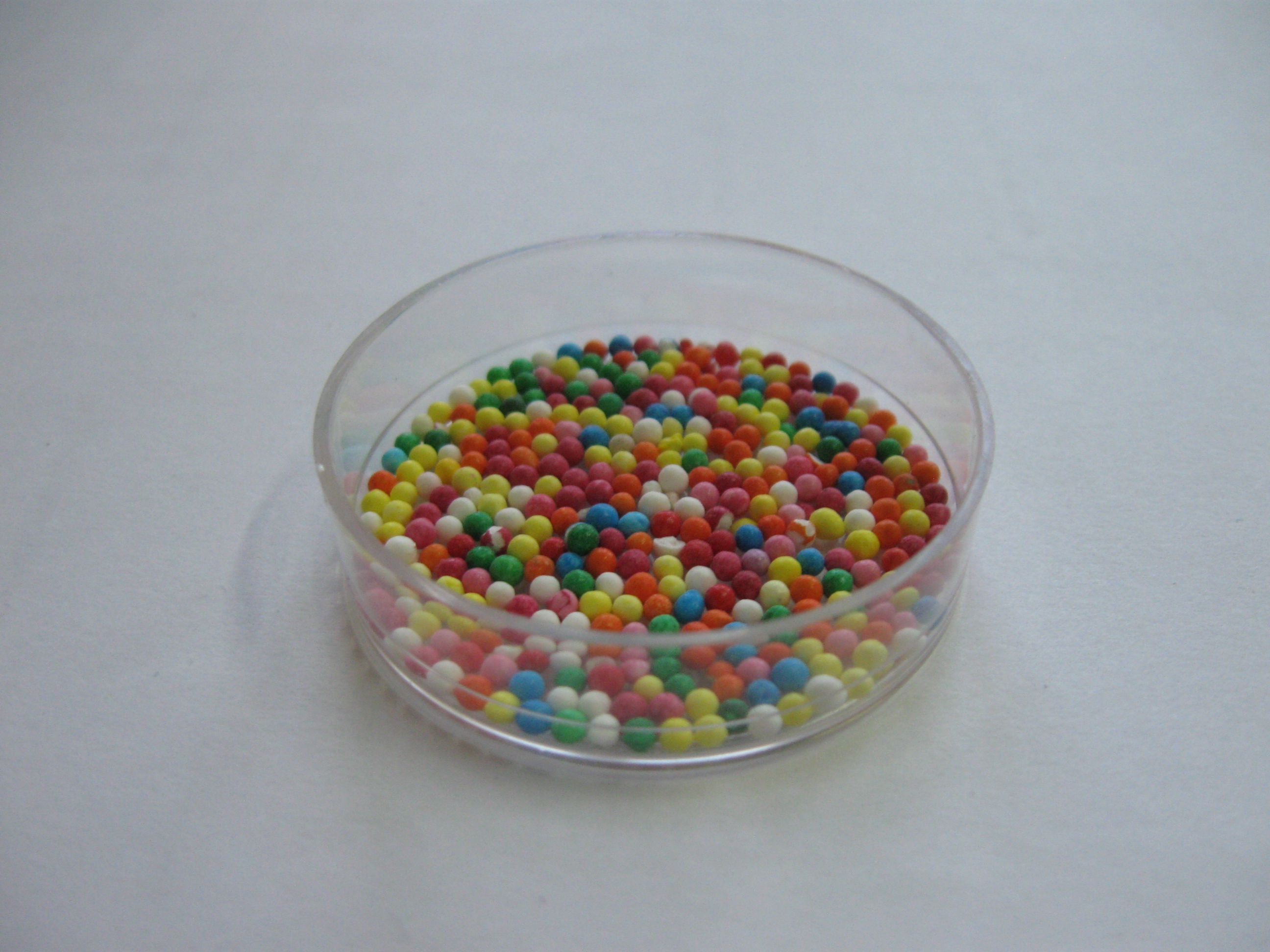 Sample of Self-ordering of Christmas Cake Balls Decoration in Petri dish. Image Credit--D. Bychanok/ Research Institute for Nuclear Problems BSU, Belarus