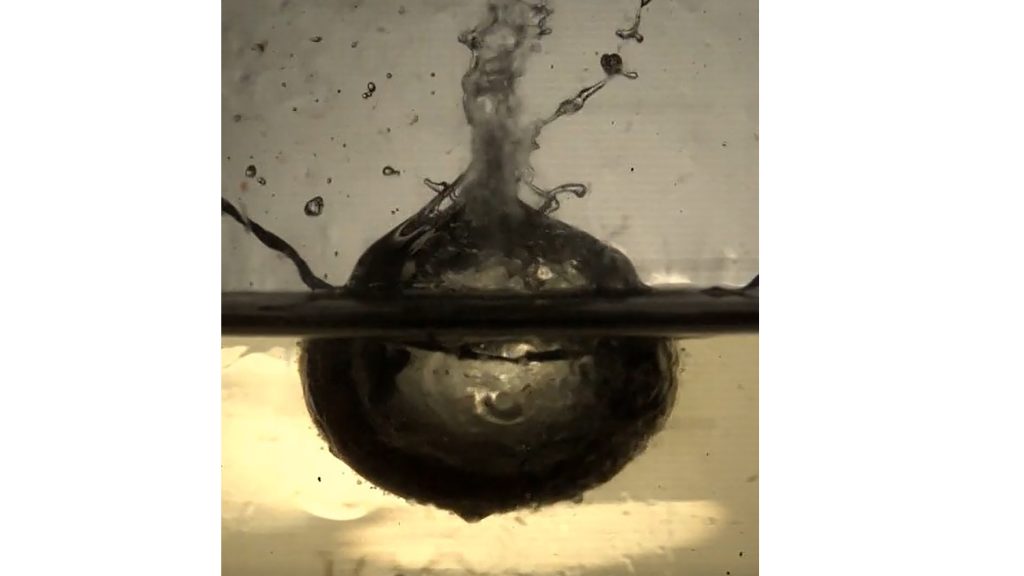 Explosion cavity which forms when a water droplet hits hot oil. CREDIT: Tadd T. Truscott