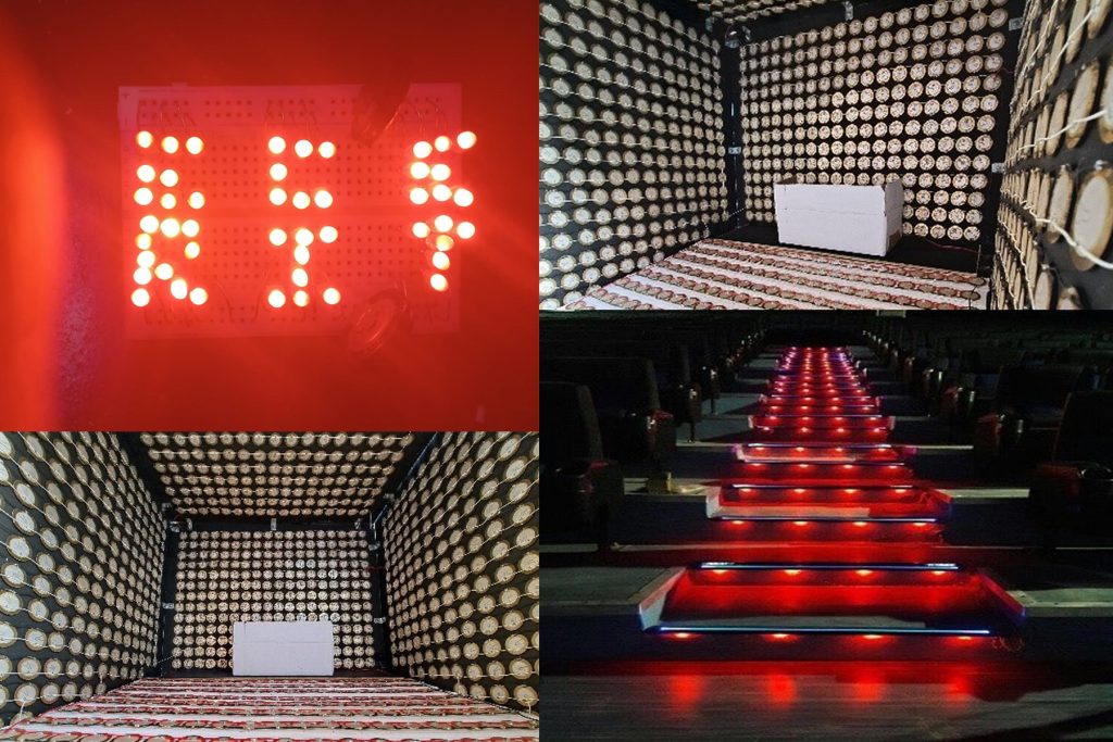 Miniature proof of concept of piezoelectric sensors installed on the floor, walls, and ceiling, arranged in a grid to fill each surface, along with LED lights they can power.