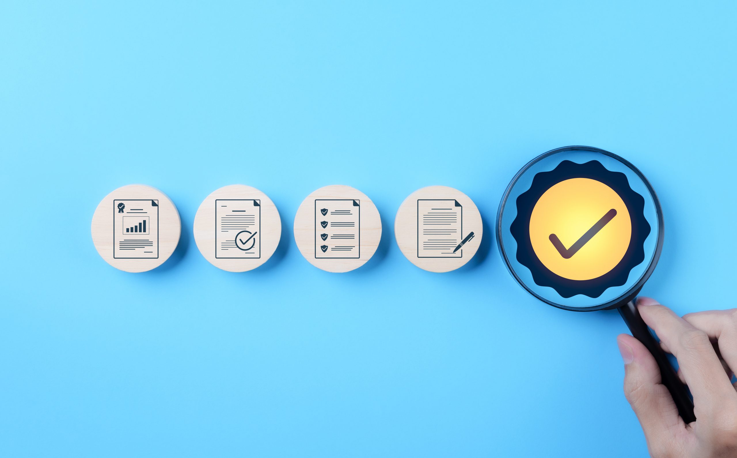 Checklist-style document icons with a highlighted approval symbol.